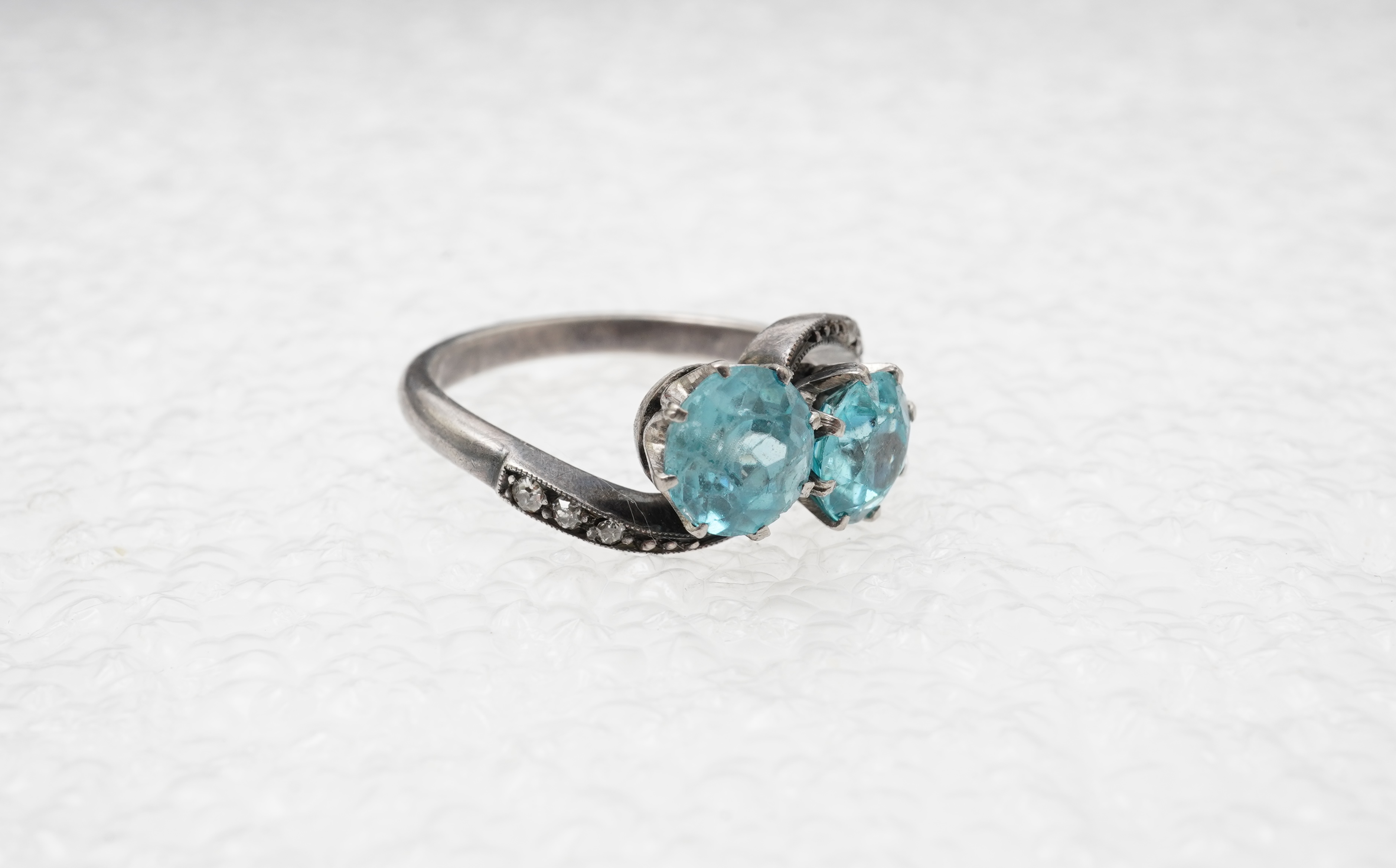 A zircon and diamond 'toi-et-moi' ring
